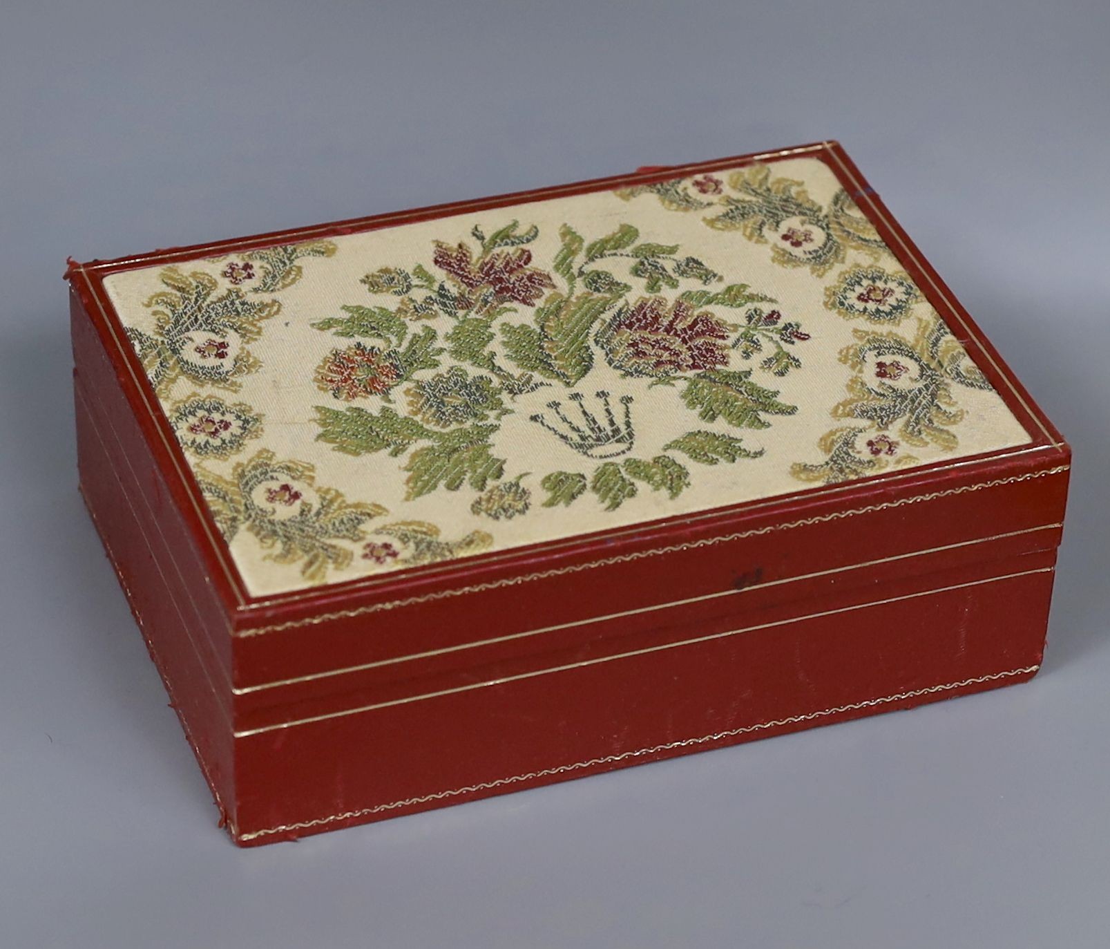 A Rolex gilt tooled and fabric covered lid, red leather wrist watch box, 18cm